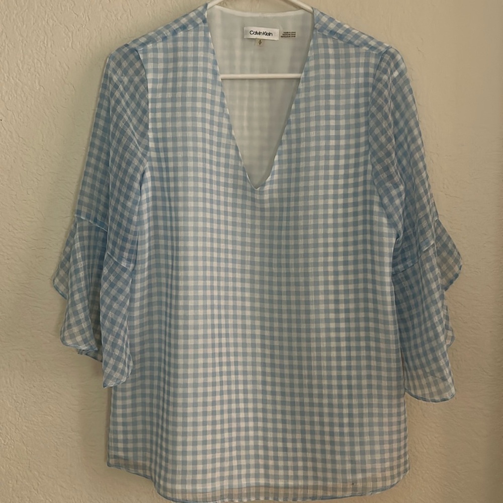Cute blue/white check Calvin Klein top, with bell sleeves label S lined.